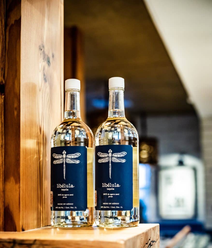 two bottles of Libélula tequila