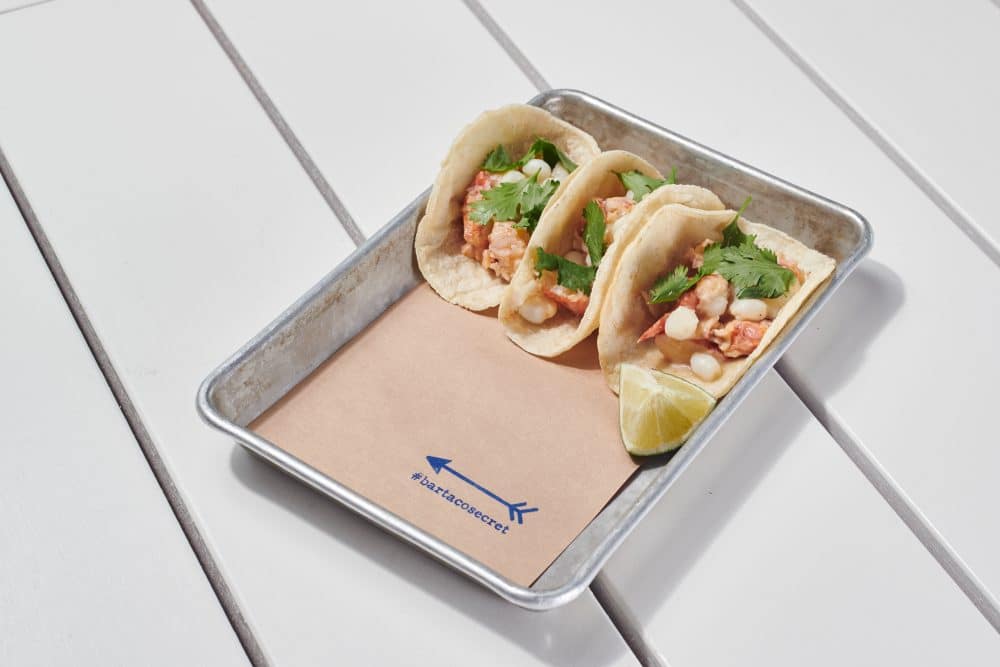 just in time for #nationallobsterday on 6/15, we welcomed back a fan favorite taco as our new #bartacosecret taco for the summer. we’re bringing you all the fresh + coastal flavors that transport your taste buds to sunny days spent by the beach. say hello to our #bartacosecret lobster taco—delicate lobster meat poached with warm lemon brown butter + served on top of a bed of nutty + sweet hominy, garnished with cilantro.