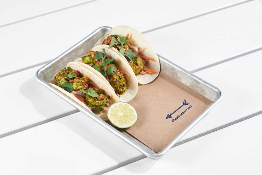 spice things up with the #bartacosecret chile-lime shrimp taco—spicy + tangy chile-lime marinated shrimp resting on a crisp + bright vegetable escabeche and finished with a flavorful pepita salsa macha.